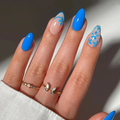 Azure Blossom blue floral almond press on nails on model hands