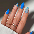 Azure Blossom blue floral almond press on nails on model hands