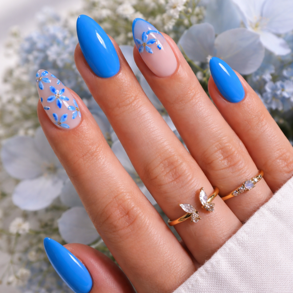 Azure Blossom blue floral almond press on nails on model hands