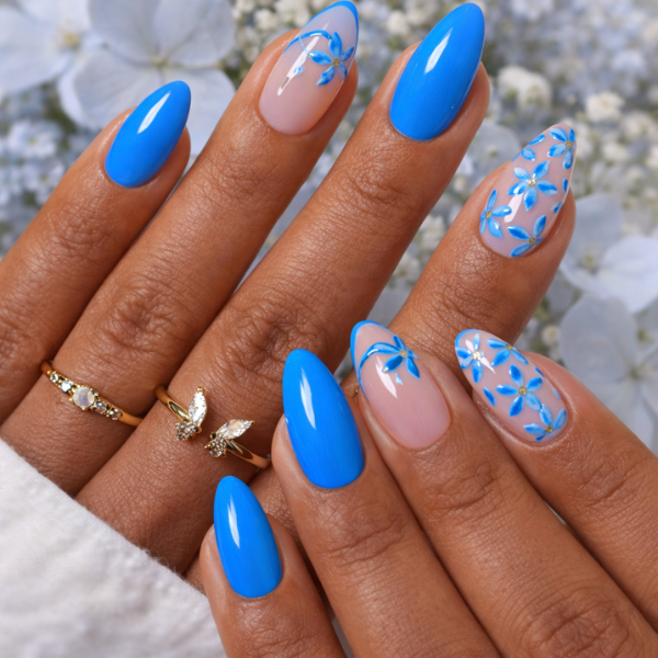 Azure Blossom blue floral almond press on nails on model hands