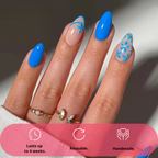 Azure Blossom blue floral almond press on nails on model hands