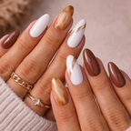 Caramel Marble brown white almond press on nails with marble design and gold accents on model hands