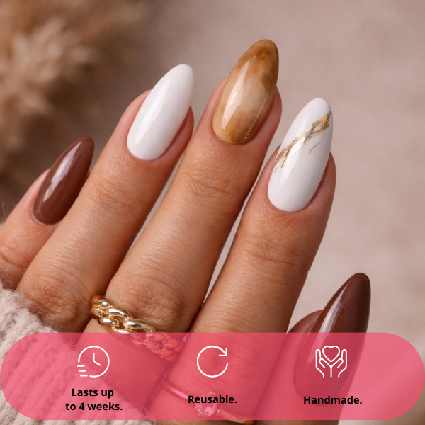 Caramel Marble brown white almond press on nails with marble design and gold accents on model hands