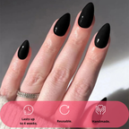Midnight Luxe glossy black almond press on nails on model hands