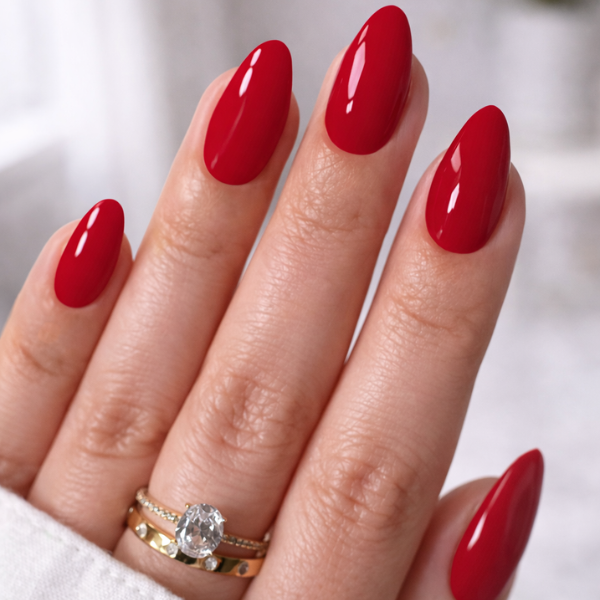 press-on nails Scarlet Elegance glossy red almond on model hands