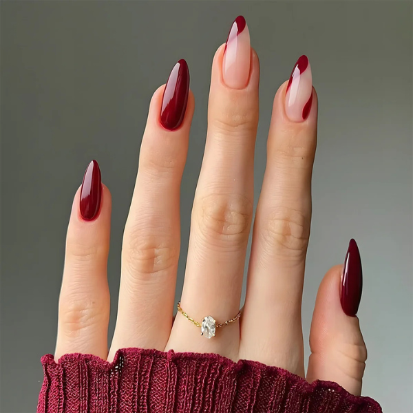 press-on nails Velvet Merlot burgundy french almond on model hands